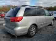 2010 Toyota Sienna CE с VIN 5TDKK4CC1AS289727, выставлен на аукционе Copart как лот 89536445 с пробегом 177 097 миль миль и Списание • Salvage title. История ставок и продаж доступна на DreamBid. Изображение 3.