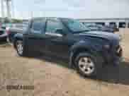 2011 Nissan Frontier Pro-4X with VIN 1N6AD0EVXBC415936, listed as a Copart auction lot 80282525 with 157,766 mi miles and Salvage title. Bid and sale history available at DreamBid. Image 4.