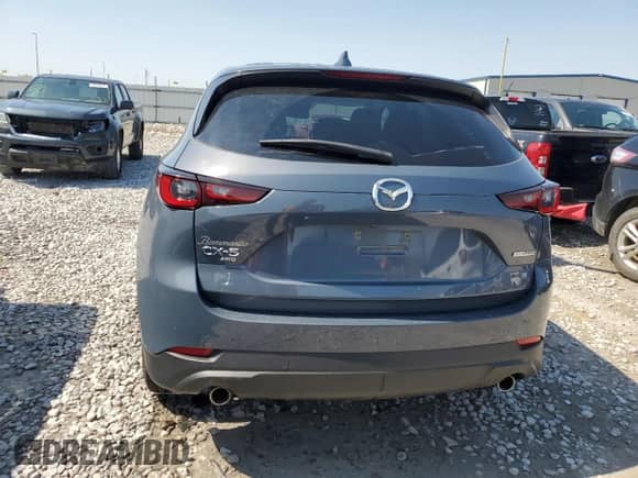 2022 Mazda CX-5 S Preferred z VIN JM3KFBCM3N1623591, wystawiony jako Copart lot #53274515 z przebiegiem 52 981 mil mil oraz Szkoda całkowita • Salvage title. Historia ofert i sprzedaży dostępna na DreamBid. Obrazek 6.