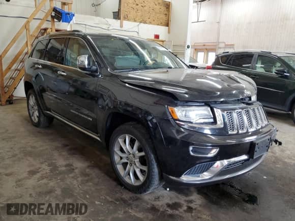 2014 Jeep Grand Cherokee Summit with VIN 1C4RJFJT8EC500512, listed as a Copart auction lot 67991355 with 127,729 mi miles and Non repairable. Bid and sale history available at DreamBid. Image 4.