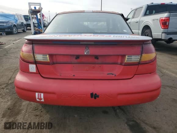 1999 Saturn SC с VIN 1G8ZR1270XZ271458, выставлен на аукционе Copart как лот 65438345 с пробегом Не указан миль и Чистый • Clean title. История ставок и продаж доступна на DreamBid. Изображение 6.