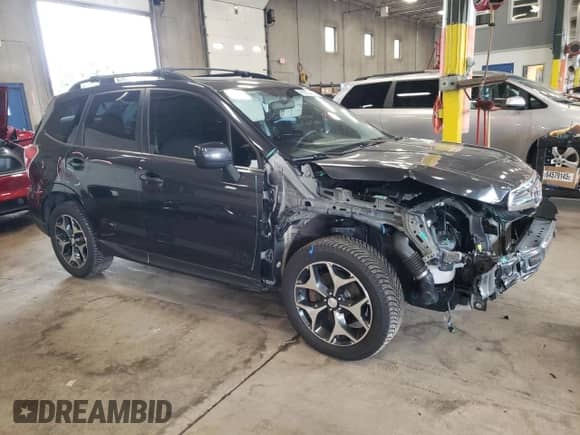 2015 Subaru Forester XT Premium with VIN JF2SJGDC4FH820418, listed as a Copart auction lot 65555425 with 112,791 mi miles and Salvage title. Bid and sale history available at DreamBid. Image 4.