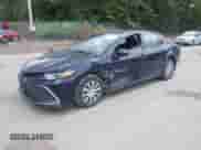 2022 Toyota Camry Hybrid LE with VIN 4T1C31AK7NU039528, listed as a IAAI auction lot 43074615 with 32,641 mi miles and . Bid and sale history available at DreamBid. Image 2.