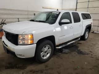 2011 Chevrolet Silverado 1500 LTZ with VIN 3GCPKTE2XBG386753, listed as a Copart auction lot 52671265 with 330,613 mi miles and Salvage title. Bid and sale history available at DreamBid. Image 1.
