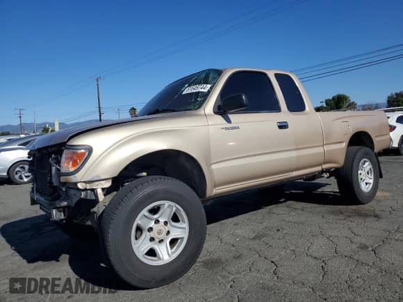 1997 Toyota Tacoma z VIN 4TAWM72NXVZ328170, wystawiony jako Copart lot #81649744 z przebiegiem 171 620 mil mil oraz Szkoda całkowita • Salvage title. Historia ofert i sprzedaży dostępna na DreamBid. Obrazek 1.
