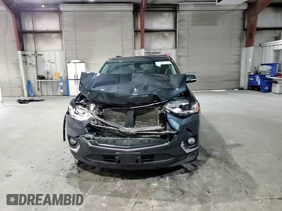 2020 Chevrolet Traverse LT с VIN 1GNEVHKW0LJ215780, выставлен на аукционе Copart как лот 71681455 с пробегом 96 838 миль миль и Списание • Salvage title. История ставок и продаж доступна на DreamBid. Изображение 14.
