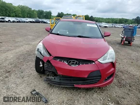 2013 Hyundai Veloster w/Black Int z VIN KMHTC6AD5DU173242, wystawiony jako Copart lot #54733125 z przebiegiem 157 766 mil mil oraz Czysty tytuł • Clean title. Historia ofert i sprzedaży dostępna na DreamBid. Obrazek 13.
