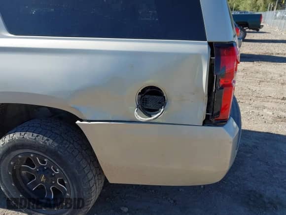 2015 Chevrolet Suburban with VIN 1GNSK5EC1FR682675, listed as a IAAI auction lot 43283608 with 203,132 mi miles and . Bid and sale history available at DreamBid. Image 18.