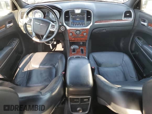 2012 Chrysler 300 Limited z VIN 2C3CCACG2CH242411, wystawiony jako Copart lot #80325775 z przebiegiem 165 492 mil mil oraz Szkoda całkowita • Salvage title. Historia ofert i sprzedaży dostępna na DreamBid. Obrazek 8.