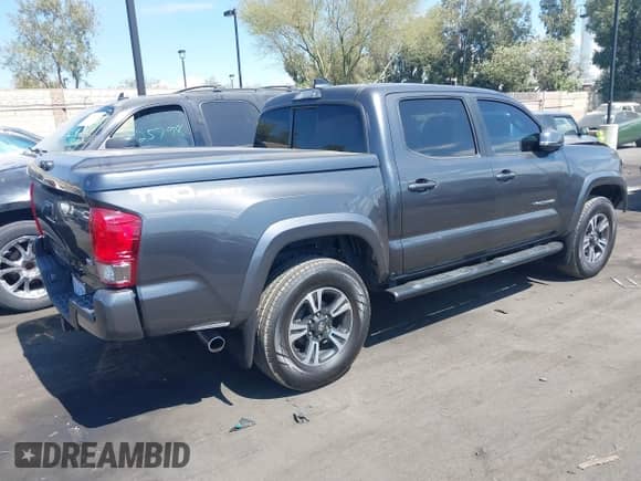 2016 Toyota Tacoma SR5 with VIN 3TMAZ5CNXGM009360, listed as a IAAI auction lot 43186084 with 89,490 mi miles and . Bid and sale history available at DreamBid. Image 4.