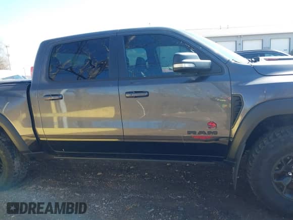 2022 Ram 1500 TRX with VIN 1C6SRFU99NN311731, listed as a IAAI auction lot 41857579 with 20,627 mi miles and . Bid and sale history available at DreamBid. Image 13.