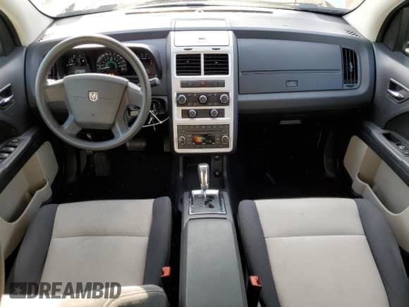 2009 Dodge Journey SXT with VIN 3D4GH57V09T508350, listed as a Copart auction lot 66213735 with 149,765 mi miles and Salvage title. Bid and sale history available at DreamBid. Image 8.
