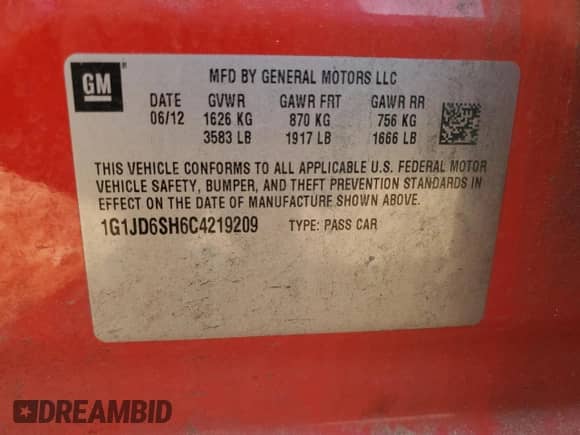 2012 Chevrolet Sonic LT z VIN 1G1JD6SH6C4219209, wystawiony jako Copart lot #69322235 z przebiegiem 117 578 mil mil oraz Szkoda całkowita • Salvage title. Historia ofert i sprzedaży dostępna na DreamBid. Obrazek 12.