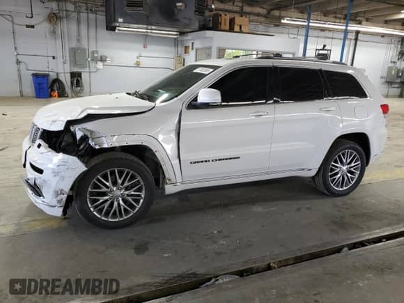 2018 Jeep Grand Cherokee Summit with VIN 1C4RJFJT5JC273869, listed as a Copart auction lot 57482865 with 70,843 mi miles and Salvage title. Bid and sale history available at DreamBid. Image 1.
