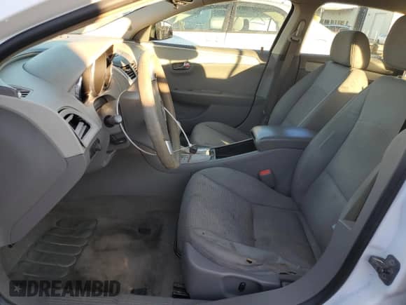 2009 Chevrolet Malibu 1LS with VIN 1G1ZG57B094198651, listed as a Copart auction lot 86979904 with 212,658 mi miles and Salvage title. Bid and sale history available at DreamBid. Image 7.