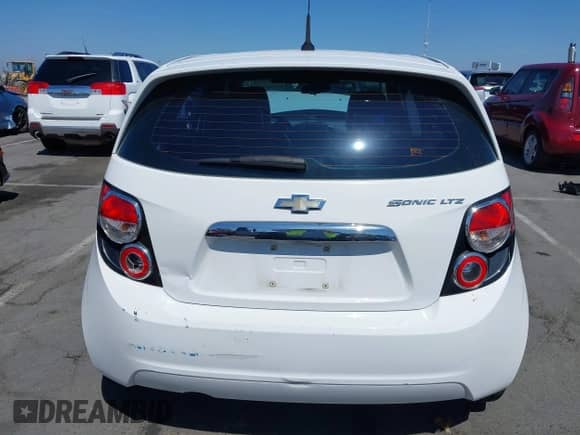 2013 Chevrolet Sonic с VIN 1G1JE6SG8D4170343, выставлен на аукционе IAAI как лот 42863124 с пробегом 213 204 миль миль и . История ставок и продаж доступна на DreamBid. Изображение 16.