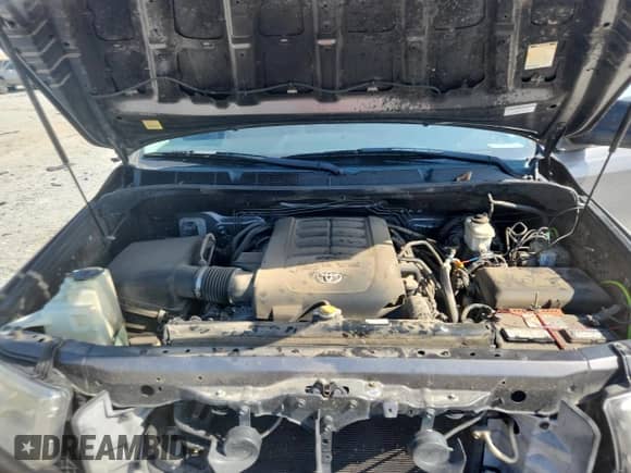 2012 Toyota Tundra z VIN 5TFRY5F13CX123560, wystawiony jako Copart lot #71097505 z przebiegiem 190 171 mil mil oraz Szkoda całkowita • Salvage title. Historia ofert i sprzedaży dostępna na DreamBid. Obrazek 11.