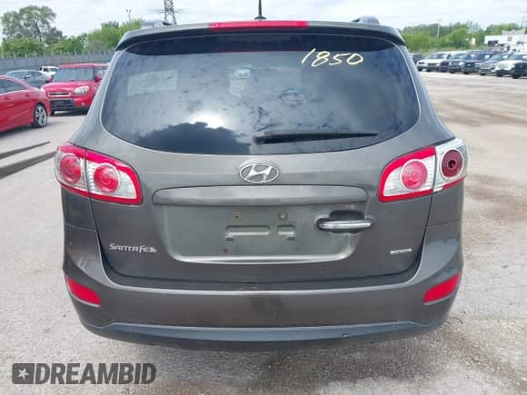 2012 Hyundai Santa Fe Limited with VIN 5XYZK4AG8CG118820, listed as a IAAI auction lot 42361850 with 298,744 mi miles and . Bid and sale history available at DreamBid. Image 12.