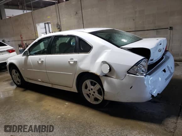 2013 Chevrolet Impala Police z VIN 2G1WD5E3XD1243509, wystawiony jako Copart lot #66715925 z przebiegiem 158 766 mil mil oraz Szkoda całkowita • Salvage title. Historia ofert i sprzedaży dostępna na DreamBid. Obrazek 2.