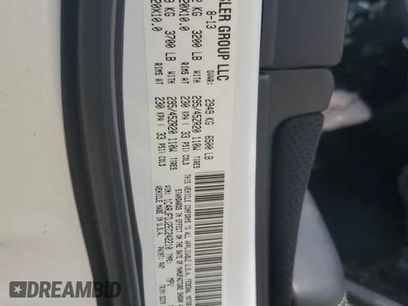 2014 Jeep Grand Cherokee SRT-8 z VIN 1C4RJFDJ2EC242210, wystawiony jako Copart lot #60677855 z przebiegiem 68 050 mil mil oraz Szkoda całkowita • Salvage title. Historia ofert i sprzedaży dostępna na DreamBid. Obrazek 13.