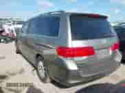 2009 Honda Odyssey EX with VIN 5FNRL38429B050727, listed as a IAAI auction lot 43100771 with 158,636 mi miles and . Bid and sale history available at DreamBid. Image 3.