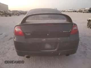 2004 Dodge Neon SRT-4 z VIN 1B3ES66S04D551900, wystawiony jako Copart lot #77032244 z przebiegiem Nie podano mil oraz Szkoda całkowita • Salvage title. Historia ofert i sprzedaży dostępna na DreamBid. Obrazek 6.