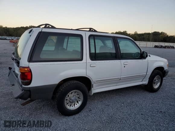 1999 Ford Explorer XL with VIN 1FMZU32X5XZB67060, listed as a Copart auction lot 75335154 with 146,823 mi miles and Salvage title. Bid and sale history available at DreamBid. Image 3.