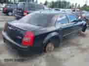 2006 Chrysler 300 C SRT-8 with VIN 2C3LA73W36H450317, listed as a IAAI auction lot 43148082 with 110,634 mi miles and . Bid and sale history available at DreamBid. Image 4.