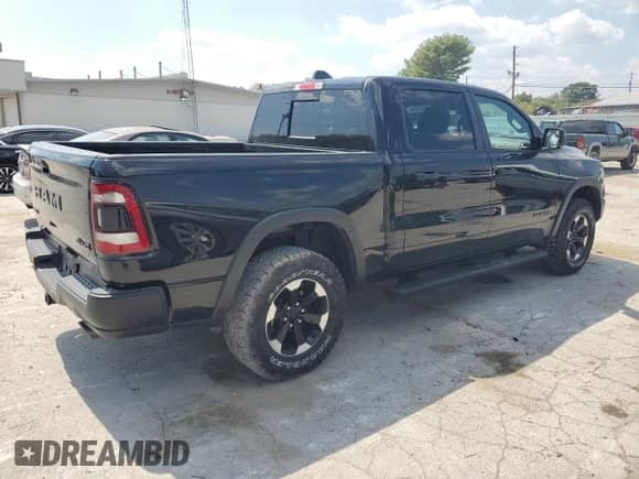 2022 Ram 1500 Rebel z VIN 1C6SRFLM7NN362506, wystawiony jako Copart lot #69181054 z przebiegiem 32 381 mil mil oraz Szkoda całkowita • Salvage title. Historia ofert i sprzedaży dostępna na DreamBid. Obrazek 3.