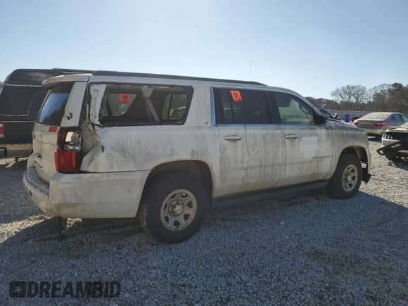 2015 Chevrolet Suburban с VIN 1GNSC5EC7FR626737, выставлен на аукционе Copart как лот 86201054 с пробегом Не указан миль и Чистый • Clean title. История ставок и продаж доступна на DreamBid. Изображение 3.