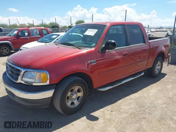 2002 Ford F-150 XLT z VIN 1FTRW07692KB55914, wystawiony jako IAAI lot #43203421 z przebiegiem 172 352 mil mil oraz . Historia ofert i sprzedaży dostępna na DreamBid. Obrazek 2.