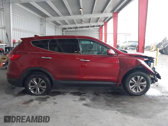 2015 Hyundai Santa Fe with VIN 5XYZTDLB2FG294927, listed as a IAAI auction lot 43297119 with 150,182 mi miles and . Bid and sale history available at DreamBid. Image 14.
