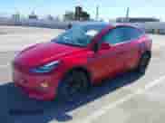 2022 Tesla Model Y Long Range z VIN 7SAYGDEE2NF352440, wystawiony jako IAAI lot #43041054 z przebiegiem 46 950 mil mil oraz . Historia ofert i sprzedaży dostępna na DreamBid. Obrazek 2.