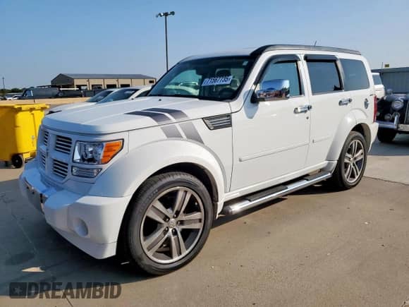 2011 Dodge Nitro Shock с VIN 1D4PU7GX9BW590667, выставлен на аукционе Copart как лот 71567735 с пробегом 253 047 миль миль и Чистый • Clean title. История ставок и продаж доступна на DreamBid. Изображение 1.