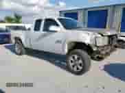 2010 GMC Sierra 1500 SLE с VIN 1GTSCVE0XAZ264149, выставлен на аукционе Copart как лот 63276565 с пробегом 211 687 миль миль и Списание • Salvage title. История ставок и продаж доступна на DreamBid. Изображение 4.