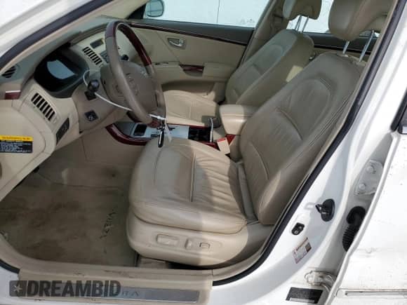 2006 Hyundai Azera SE с VIN KMHFC46F66A080035, выставлен на аукционе Copart как лот 43649395 с пробегом 142 599 миль миль и Списание • Salvage title. История ставок и продаж доступна на DreamBid. Изображение 7.