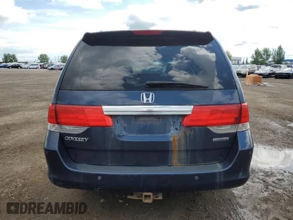 2010 Honda Odyssey with VIN 5FNRL3H81AB507082, listed as a Copart auction lot 62931535 with 328,109 mi miles and Salvage title. Bid and sale history available at DreamBid. Image 6.