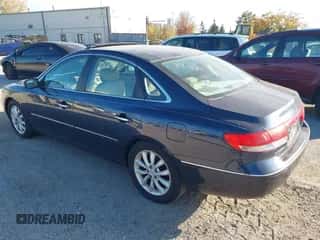 2006 Hyundai Azera SE z VIN KMHFC46F16A057813, wystawiony jako IAAI lot #43522257 z przebiegiem 165 432 mil mil oraz . Historia ofert i sprzedaży dostępna na DreamBid. Obrazek 3.