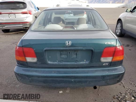 1997 Honda Civic z VIN JHMEJ854XVS002832, wystawiony jako Copart lot #84455214 z przebiegiem 205 806 mil mil oraz Czysty tytuł • Clean title. Historia ofert i sprzedaży dostępna na DreamBid. Obrazek 6.