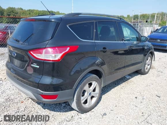 2014 Ford Escape SE with VIN 1FMCU0G91EUA34787, listed as a IAAI auction lot 43215686 with 168,628 mi miles and . Bid and sale history available at DreamBid. Image 4.
