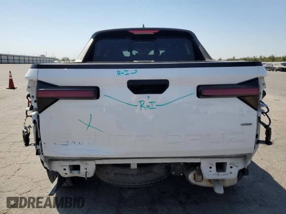 2022 Hyundai Santa Cruz SEL with VIN 5NTJCDAE9NH017954, listed as a Copart auction lot 70330024 with 61,631 mi miles and Salvage title. Bid and sale history available at DreamBid. Image 6.