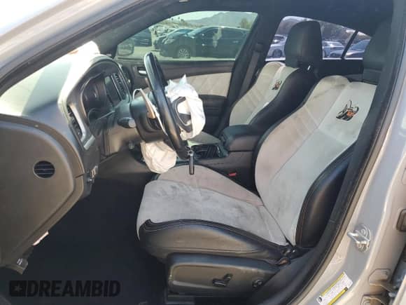 2020 Dodge Charger Scat Pack z VIN 2C3CDXGJXLH221103, wystawiony jako Copart lot #68514025 z przebiegiem 114 551 mil mil oraz Szkoda całkowita • Salvage title. Historia ofert i sprzedaży dostępna na DreamBid. Obrazek 7.