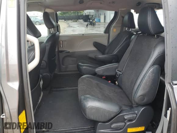 2012 Toyota Sienna SE with VIN 5TDXK3DC7CS249170, listed as a Copart auction lot 81018255 with 152,596 mi miles and Salvage title. Bid and sale history available at DreamBid. Image 11.