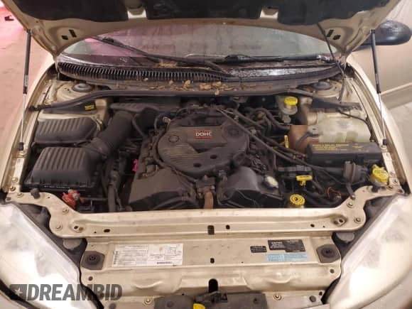 2000 Dodge Intrepid z VIN 2B3HD46R0YH259939, wystawiony jako Copart lot #70315235 z przebiegiem 122 820 mil mil oraz Czysty tytuł • Clean title. Historia ofert i sprzedaży dostępna na DreamBid. Obrazek 11.