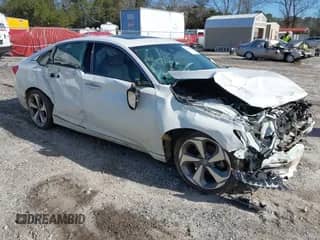2019 Honda Accord Touring with VIN 1HGCV2F98KA010886, listed as a IAAI auction lot 41648451 with 93,959 mi miles and . Bid and sale history available at DreamBid. Image 1.