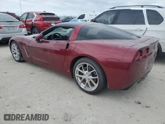 2006 Chevrolet Corvette with VIN 1G1YY26U565100990, listed as a Copart auction lot 76692824 with Not provided miles and Salvage title. Bid and sale history available at DreamBid. Image 2.
