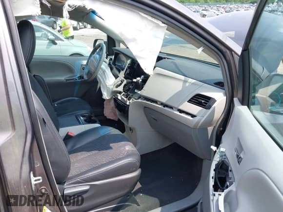 2014 Toyota Sienna SE with VIN 5TDXK3DC8ES440762, listed as a IAAI auction lot 42852260 with 191,156 mi miles and . Bid and sale history available at DreamBid. Image 5.