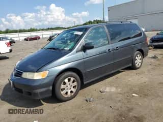 2004 Honda Odyssey EX с VIN 5FNRL18694B086512, выставлен на аукционе Copart как лот 64595775 с пробегом 175 144 миль миль и Списание • Salvage title. История ставок и продаж доступна на DreamBid. Изображение 1.