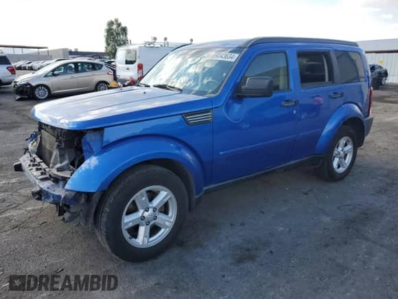 2007 Dodge Nitro SLT with VIN 1D8GT58K97W666341, listed as a Copart auction lot 69343634 with 168,897 mi miles and Salvage title. Bid and sale history available at DreamBid. Image 1.
