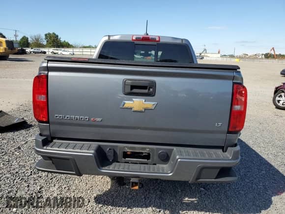 2020 Chevrolet Colorado 4WD LT с VIN 1GCGTCEN2L1247188, выставлен на аукционе Copart как лот 70724525 с пробегом 81 959 миль миль и Списание • Salvage title. История ставок и продаж доступна на DreamBid. Изображение 6.